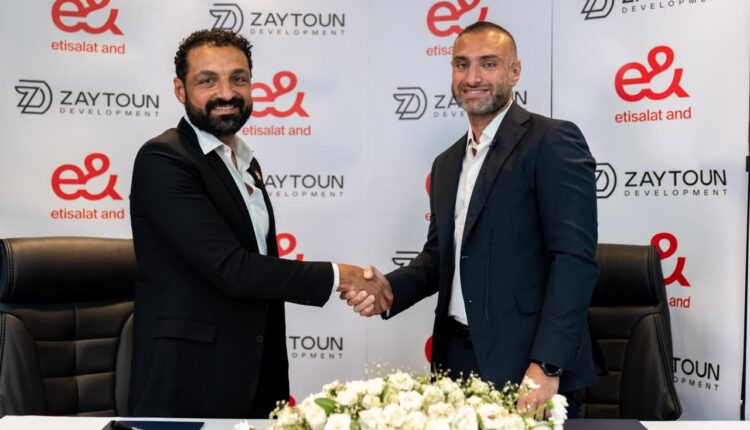 «زيتون للتطوير» تتعاقد مع «إي آند بيزنس»